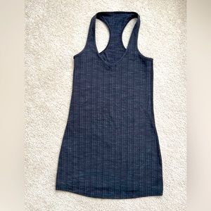 Lululemon sports top. Grey/black color.